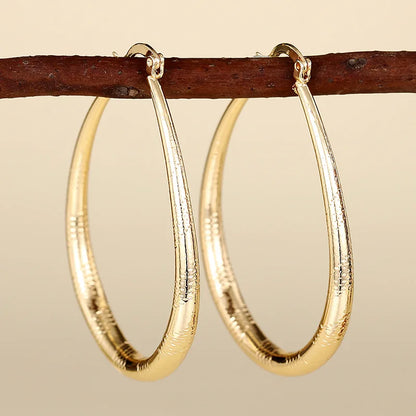 Women's Golden Hoop Earrings 18K Gold Plated Zinc Alloy Party Fashion Jewelry Large Circle Statement Accessories