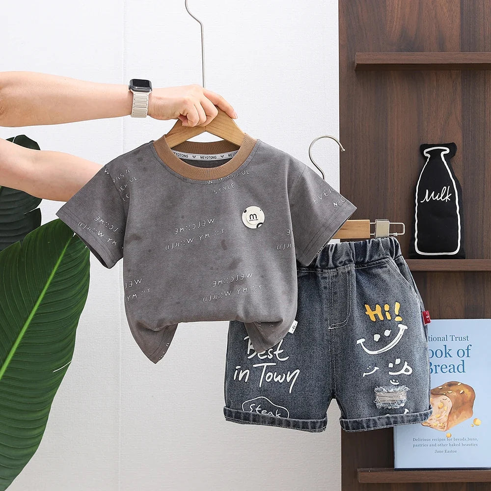 2026 LY New Summer Korean Style Cartoon Woven Loose Casual Short Sleeve 100% Cotton T-Shirt Gold-embossed Logo Young Children
