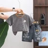 2026 LY New Summer Korean Style Cartoon Woven Loose Casual Short Sleeve 100% Cotton T-Shirt Gold-embossed Logo Young Children