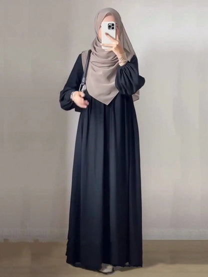 Simple and elegant black Abaya robe for fashionable Muslim women's wear