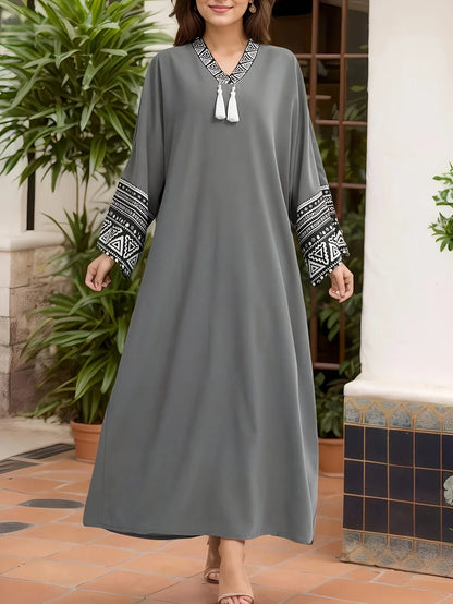 Ladies' casual and elegant Middle Eastern Muslim robe, solid color tassel detail dress, long skirt