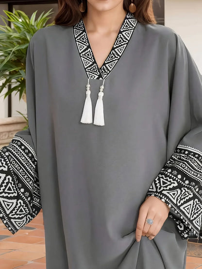 Ladies' casual and elegant Middle Eastern Muslim robe, solid color tassel detail dress, long skirt
